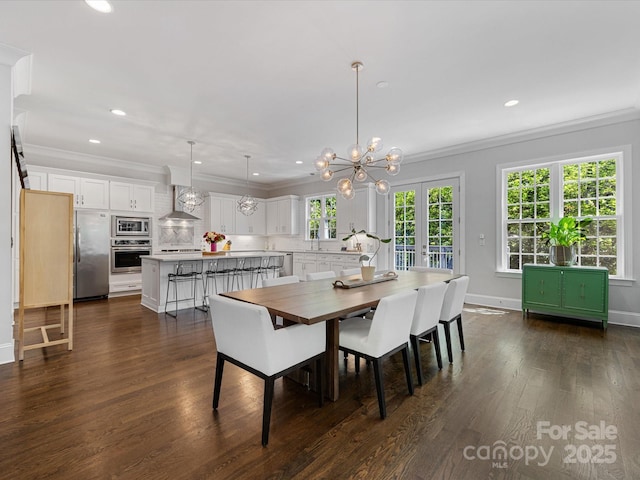 dining space with crown molding, recessed lighting, a notable chandelier, and dark wood-type flooring