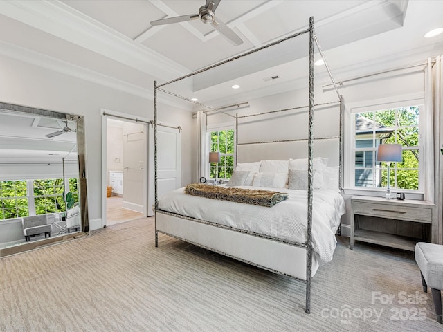 carpeted bedroom featuring multiple windows, ornamental molding, recessed lighting, and connected bathroom