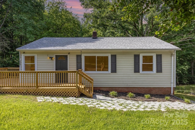 2603 Mary Ave, Gastonia, NC 28052 - ranch-style home featuring a front yard, roof with shingles, a deck, and a chimney