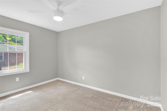 8303 Hemby Wood Dr, Indian Trail, NC 28079 - spare room with carpet, baseboards, and a ceiling fan