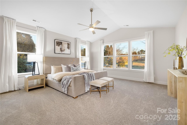 bedroom with baseboards, visible vents, lofted ceiling, and carpet