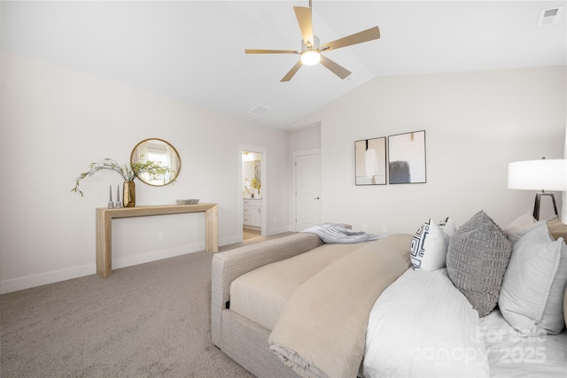 bedroom with baseboards, visible vents, light carpet, and lofted ceiling