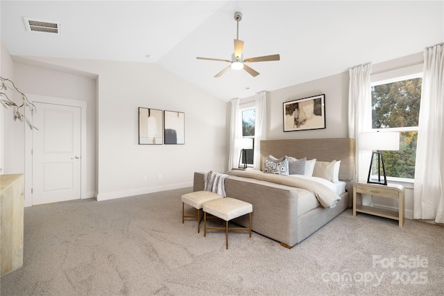 bedroom featuring ceiling fan, visible vents, baseboards, lofted ceiling, and carpet