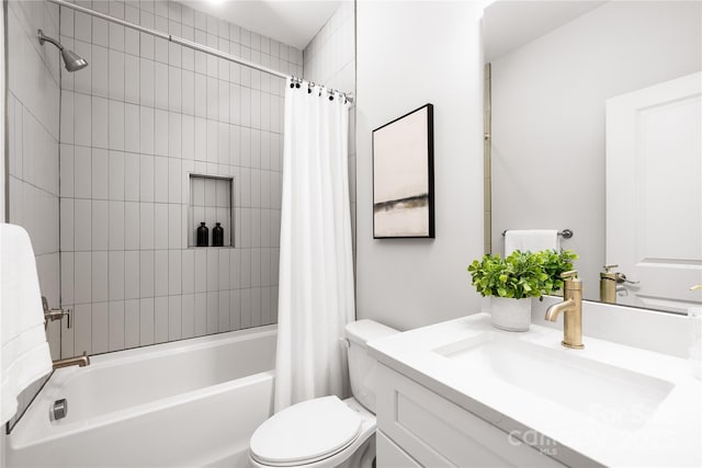 bathroom with vanity, toilet, and shower / bath combination with curtain
