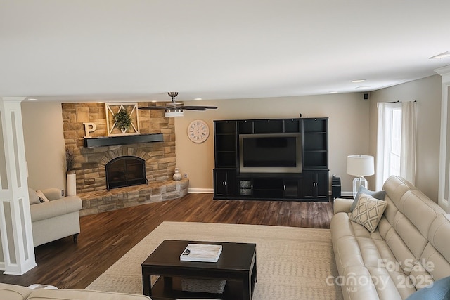 8056 Stevens Mill Rd, Matthews, NC 28104 - living area with dark wood-style flooring, a fireplace, recessed lighting, and a ceiling fan