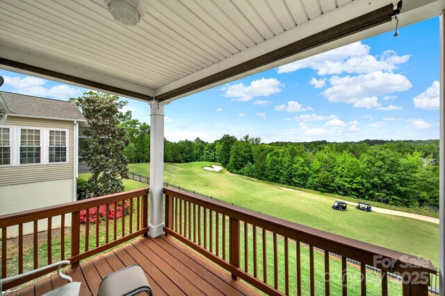 deck featuring a yard