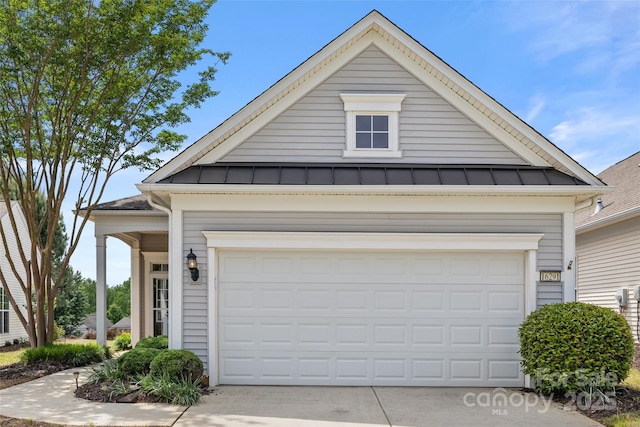 16291 Raven Crest Dr, Indian Land, SC 29707 - view of front of property featuring concrete driveway, metal roof, and a standing seam roof