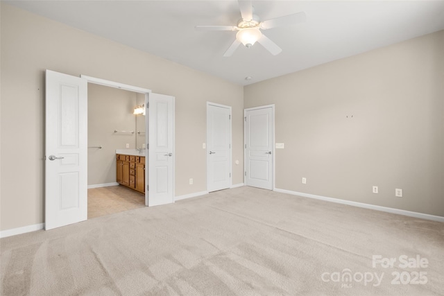 16291 Raven Crest Dr, Indian Land, SC 29707 - unfurnished bedroom with baseboards, ceiling fan, ensuite bath, and light carpet