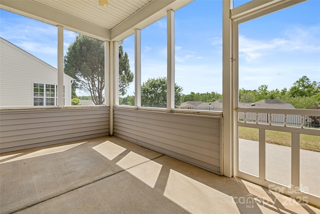 16291 Raven Crest Dr, Indian Land, SC 29707 - unfurnished sunroom featuring carpet flooring
