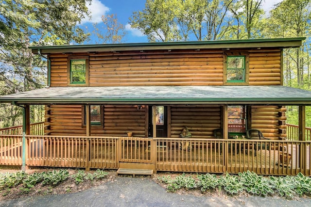 41 Log Cabin Dr, Maggie Valley, NC 28751 - cabin featuring covered porch and log exterior