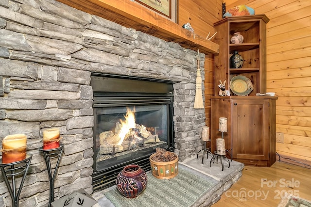 41 Log Cabin Dr, Maggie Valley, NC 28751 - room details with a stone fireplace, wood walls, and wood finished floors
