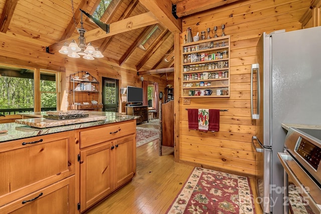 41 Log Cabin Dr, Maggie Valley, NC 28751 - kitchen featuring wooden walls, appliances with stainless steel finishes, light wood-style floors, wooden ceiling, and vaulted ceiling with beams