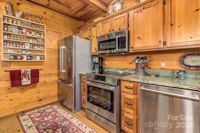 41 Log Cabin Dr, Maggie Valley, NC 28751 - kitchen with open shelves, appliances with stainless steel finishes, wood walls, wooden ceiling, and beamed ceiling