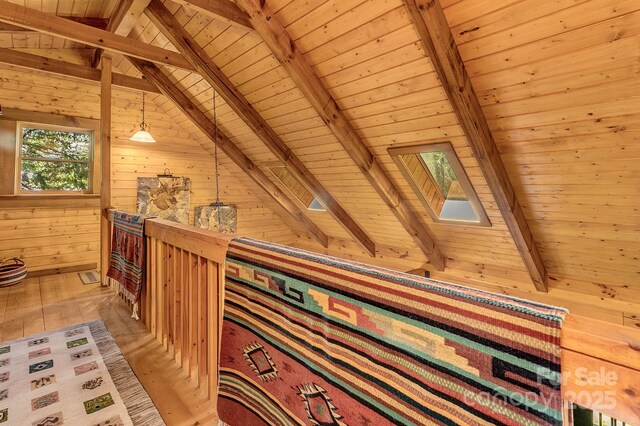 41 Log Cabin Dr, Maggie Valley, NC 28751 - hall featuring wood-type flooring, wood walls, wood ceiling, and lofted ceiling with skylight