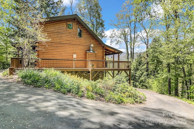 41 Log Cabin Dr, Maggie Valley, NC 28751 - view of side of property featuring a deck and log exterior