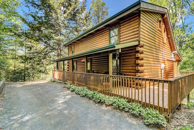 41 Log Cabin Dr, Maggie Valley, NC 28751 - view of home's exterior with a deck and log siding