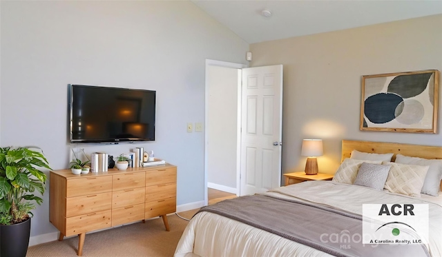 1367 Springview Ct, Rock Hill, SC 29732 - bedroom featuring light carpet, vaulted ceiling, and baseboards