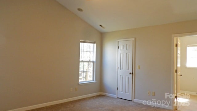 1367 Springview Ct, Rock Hill, SC 29732 - unfurnished bedroom with multiple windows, carpet, baseboards, and vaulted ceiling