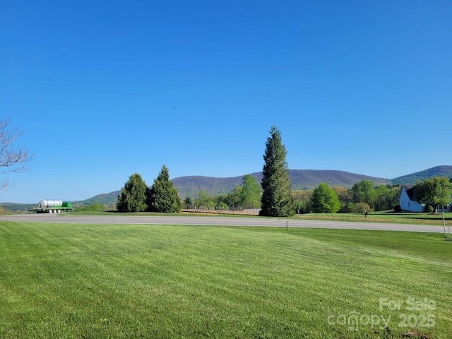 property view of mountains with a rural view