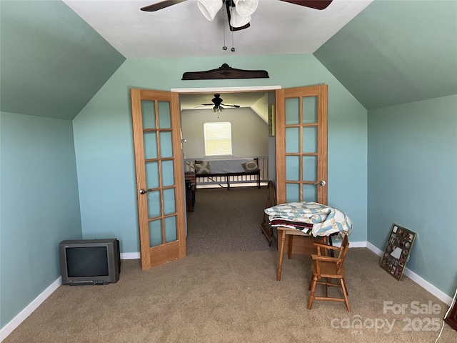 additional living space featuring baseboards, ceiling fan, vaulted ceiling, and carpet flooring