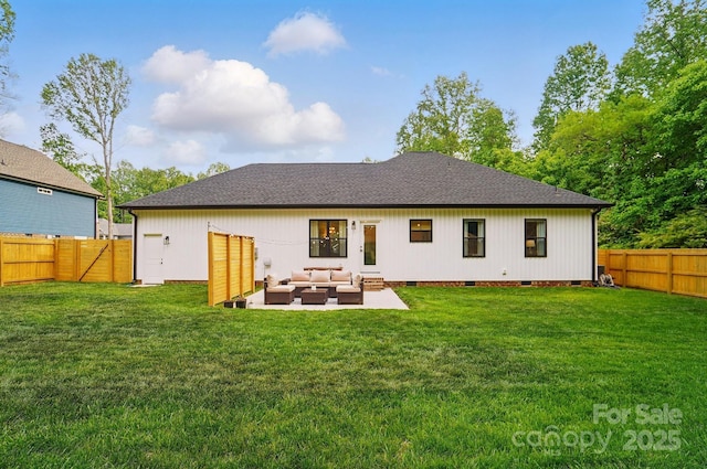 back of property with a yard, crawl space, an outdoor hangout area, and a fenced backyard