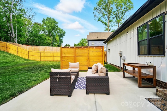 view of patio / terrace with outdoor lounge area and fence