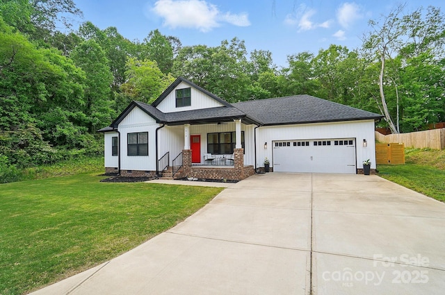 modern farmhouse featuring fence, a garage, a porch, crawl space, and concrete driveway