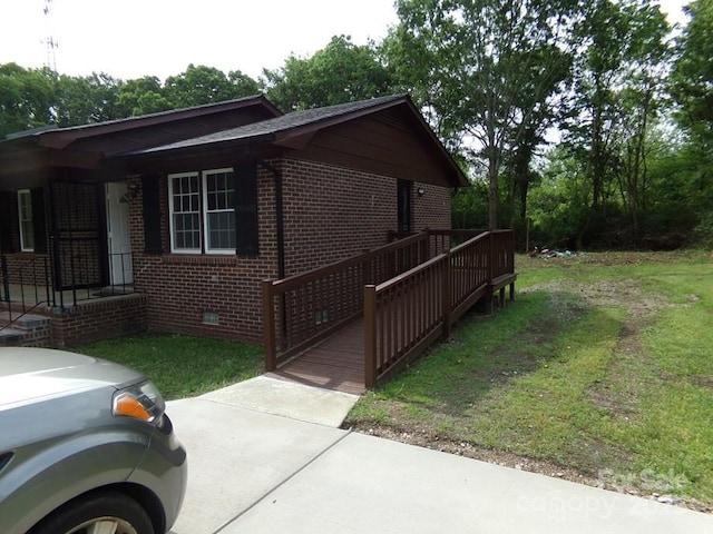 556 Roundtree Cir, Chester, SC 29706 - view of property exterior featuring brick siding, crawl space, and a yard