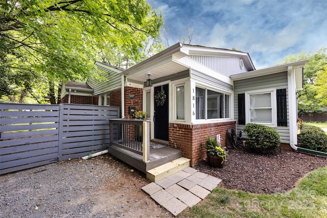 1816 Anderson St, Charlotte, NC 28205 - view of front of house with brick siding and fence