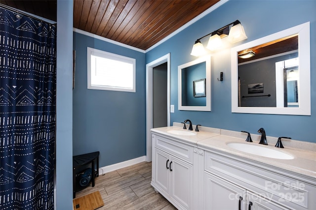 1816 Anderson St, Charlotte, NC 28205 - full bath with crown molding, double vanity, wooden ceiling, and a sink