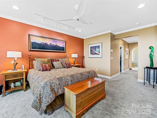 carpeted bedroom featuring crown molding and recessed lighting