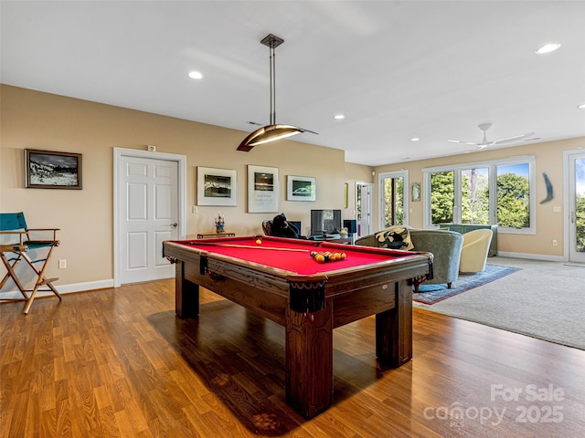 game room with baseboards, pool table, and wood finished floors