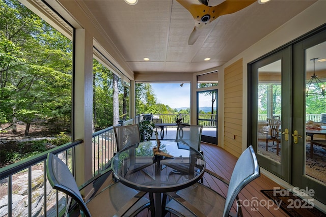 543 Hagen Dr, Hendersonville, NC 28739 - sunroom / solarium featuring ceiling fan and french doors