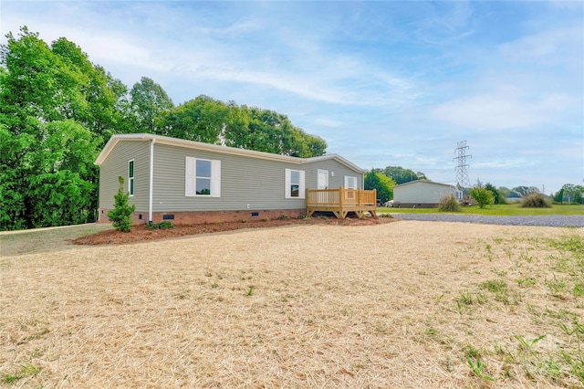445 Davis Rd, Shelby, NC 28152 - manufactured / mobile home with a wooden deck and crawl space