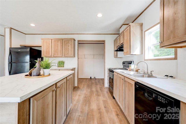 445 Davis Rd, Shelby, NC 28152 - kitchen with a sink, light wood-type flooring, black appliances, under cabinet range hood, and light countertops