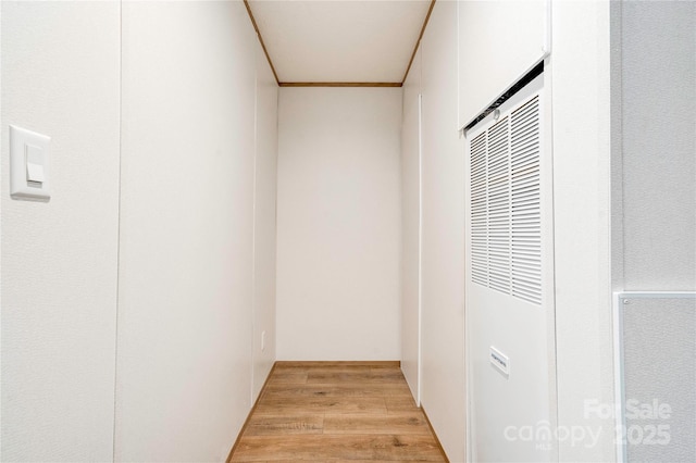 445 Davis Rd, Shelby, NC 28152 - hallway featuring ornamental molding, light wood finished floors, and a heating unit