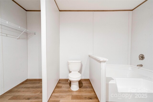 445 Davis Rd, Shelby, NC 28152 - full bath with toilet, a washtub, and wood finished floors