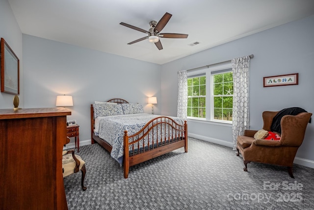 bedroom featuring visible vents, carpet flooring, and baseboards
