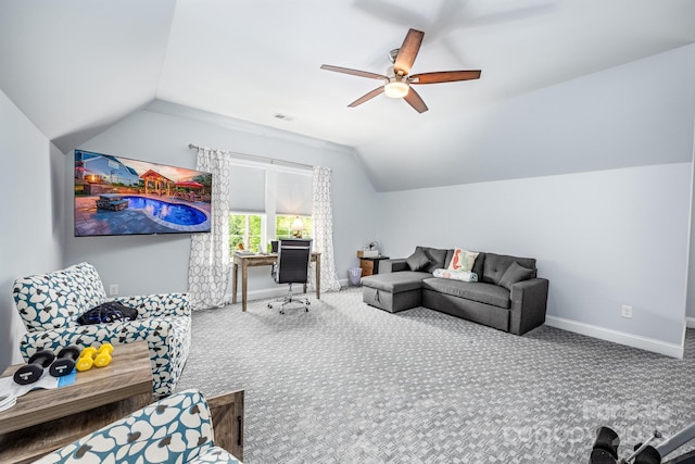 living area with a ceiling fan, visible vents, vaulted ceiling, baseboards, and carpet floors