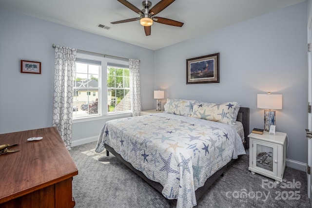 carpeted bedroom with a ceiling fan, baseboards, and visible vents