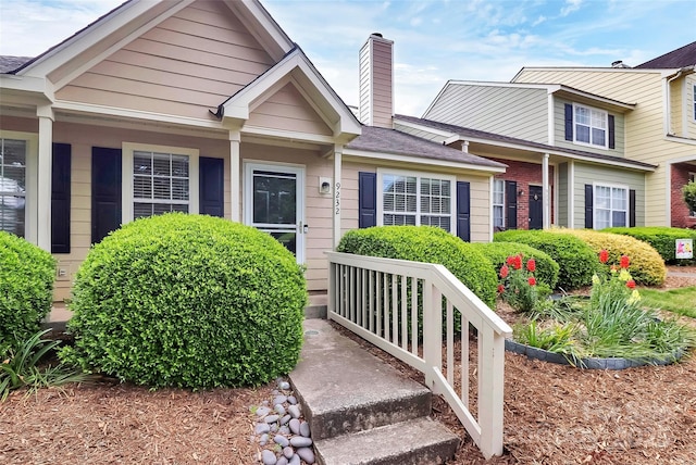 9232 Four Mile Creek Rd, Charlotte, NC 28277 - view of front facade featuring a porch and a chimney