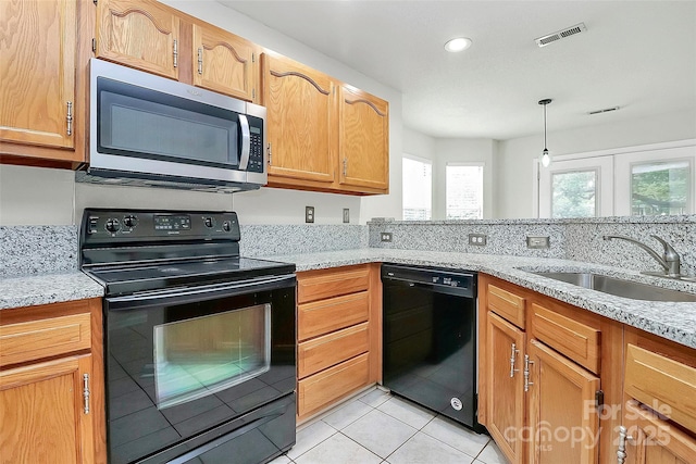 9232 Four Mile Creek Rd, Charlotte, NC 28277 - kitchen featuring visible vents, light tile patterned flooring, light stone counters, a sink, and black appliances