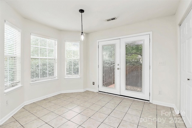 9232 Four Mile Creek Rd, Charlotte, NC 28277 - unfurnished dining area featuring french doors, baseboards, light tile patterned floors, and a wealth of natural light