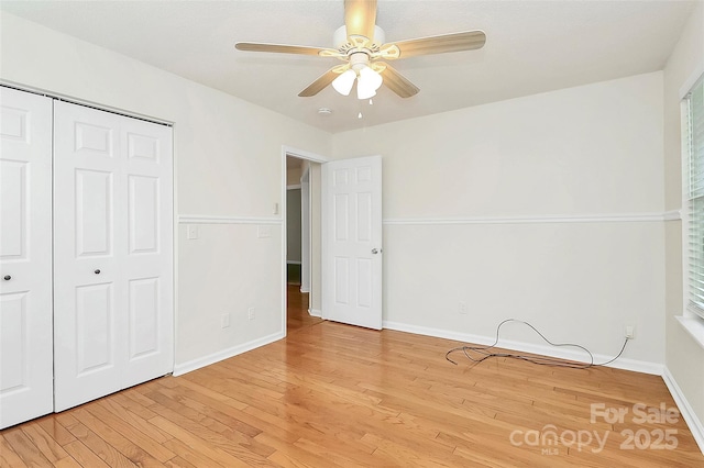 9232 Four Mile Creek Rd, Charlotte, NC 28277 - unfurnished bedroom with baseboards, ceiling fan, a closet, and light wood-style flooring