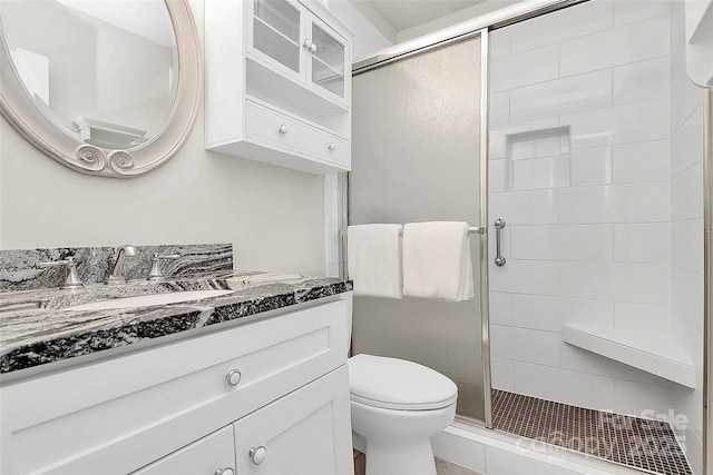 9232 Four Mile Creek Rd, Charlotte, NC 28277 - bathroom featuring toilet, a shower stall, and vanity