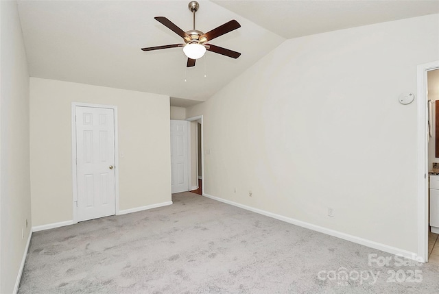 9232 Four Mile Creek Rd, Charlotte, NC 28277 - unfurnished bedroom featuring carpet floors, baseboards, vaulted ceiling, and connected bathroom