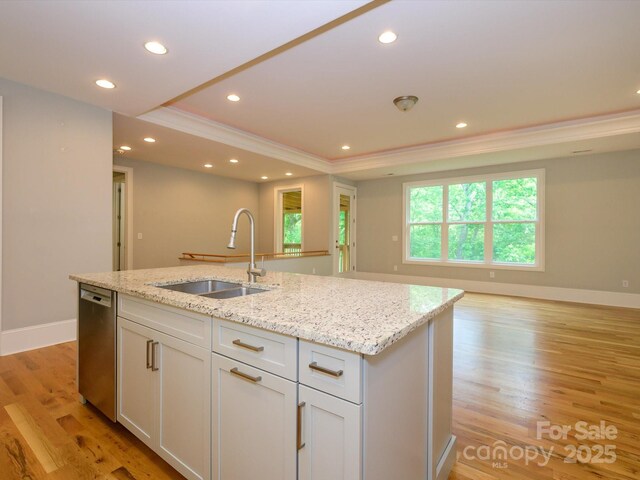 7324 Leharne Dr, Charlotte, NC 28270 - kitchen with ornamental molding, open floor plan, an island with sink, a sink, and dishwasher