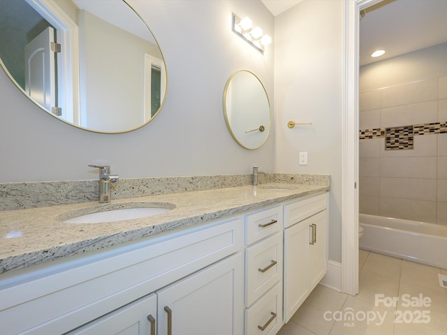 7324 Leharne Dr, Charlotte, NC 28270 - full bathroom featuring a sink, tile patterned floors, toilet, and double vanity
