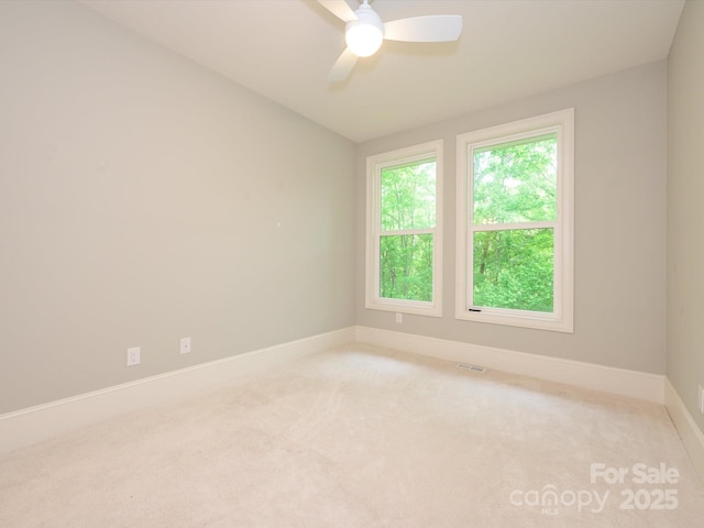 7324 Leharne Dr, Charlotte, NC 28270 - unfurnished room featuring baseboards, ceiling fan, carpet, and visible vents