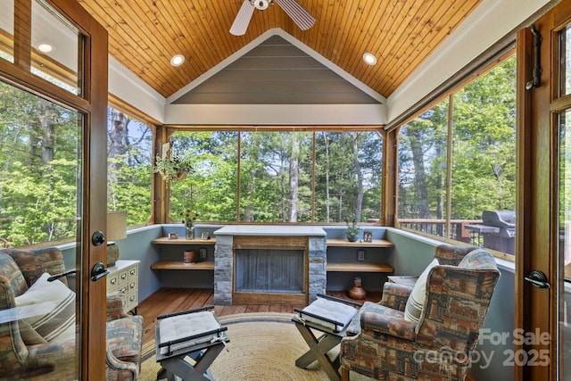 9 Oak Mountain Dr, Leicester, NC 28748 - sunroom / solarium featuring a ceiling fan, lofted ceiling, healthy amount of natural light, and view of scattered trees